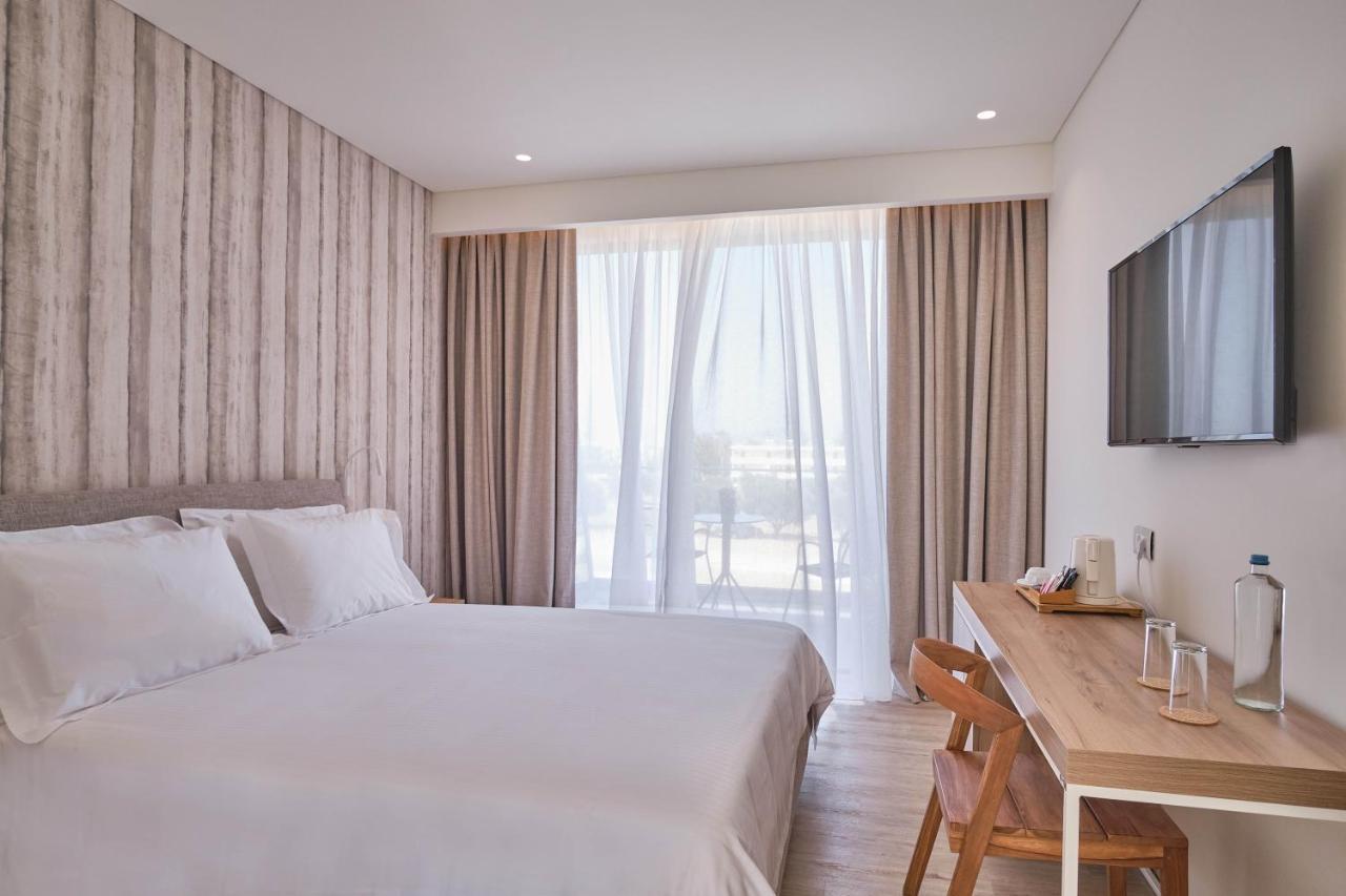 Utopia Blu Hotel Тигаки Экстерьер фото