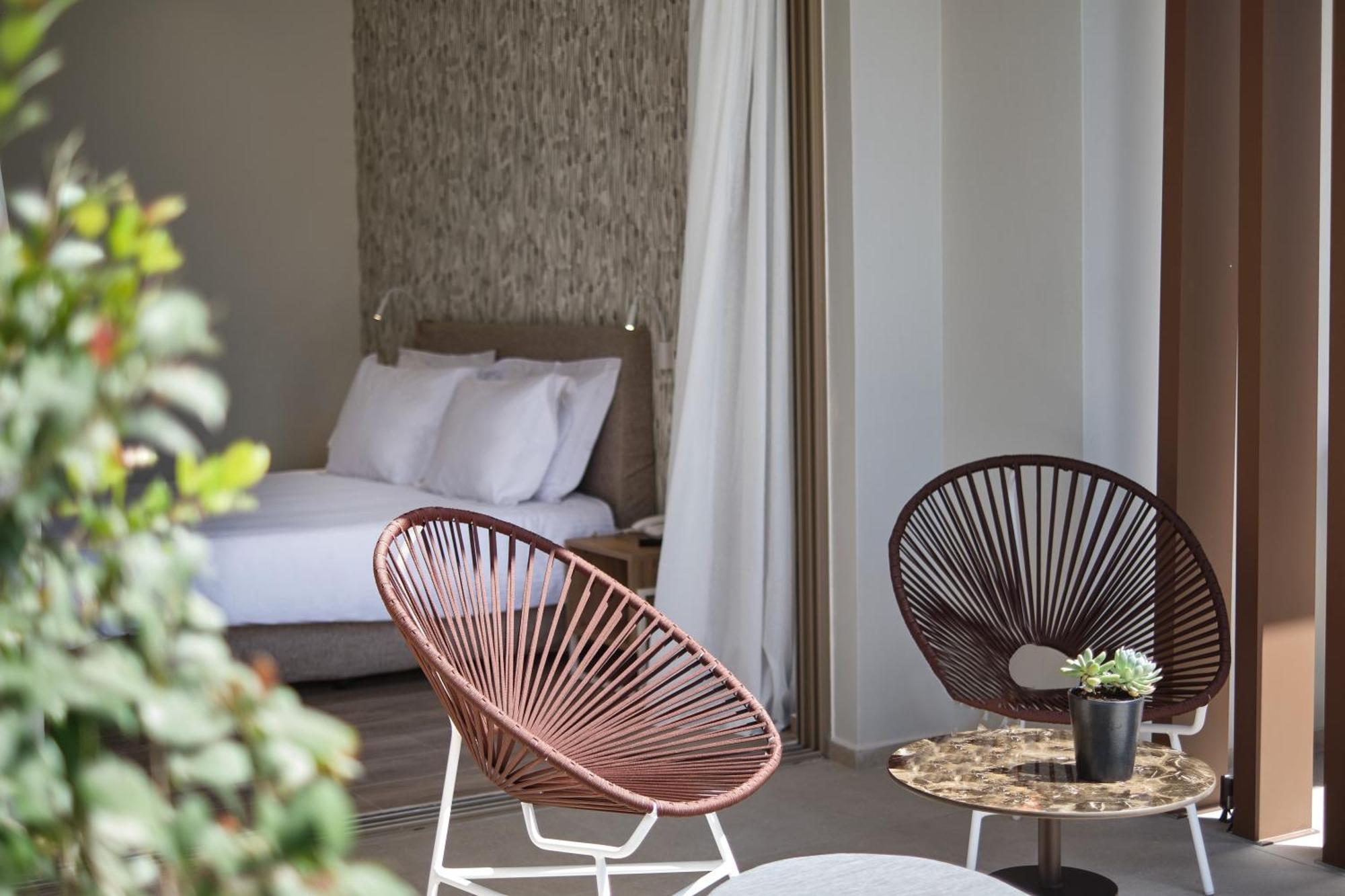Utopia Blu Hotel Тигаки Экстерьер фото