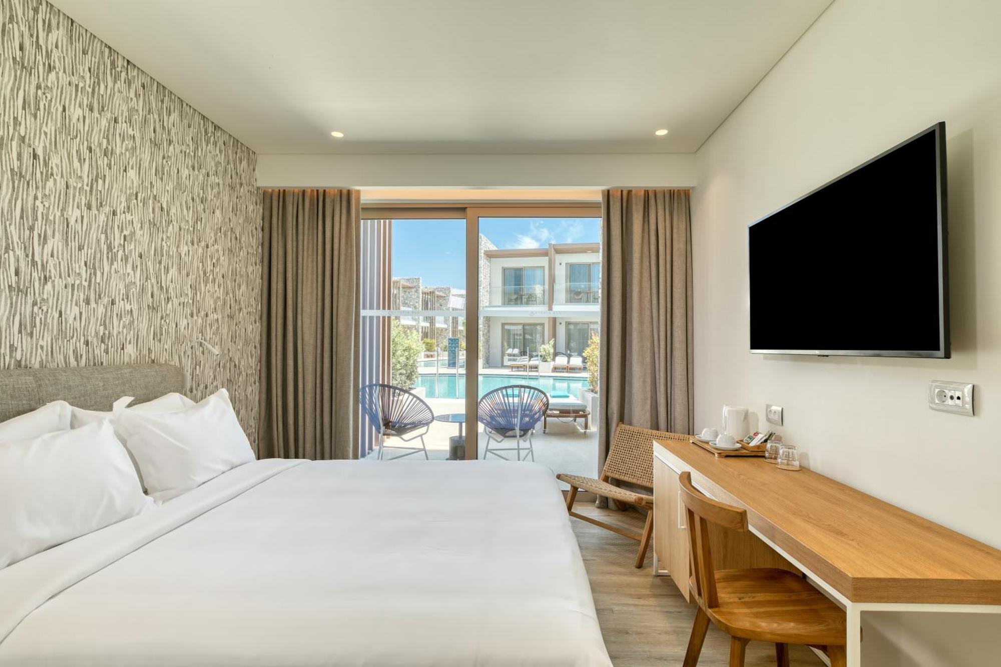 Utopia Blu Hotel Тигаки Экстерьер фото