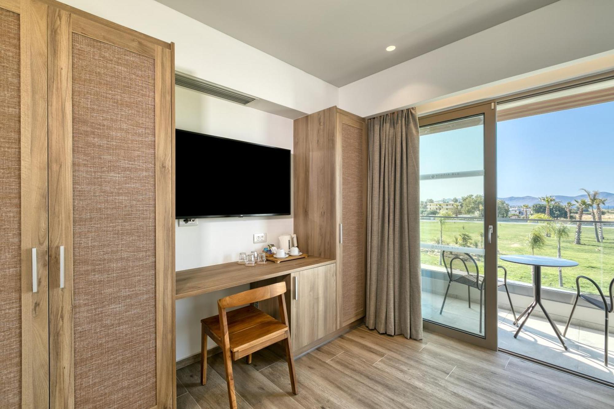 Utopia Blu Hotel Тигаки Экстерьер фото